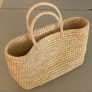 Cute little straw purse by Unalome
